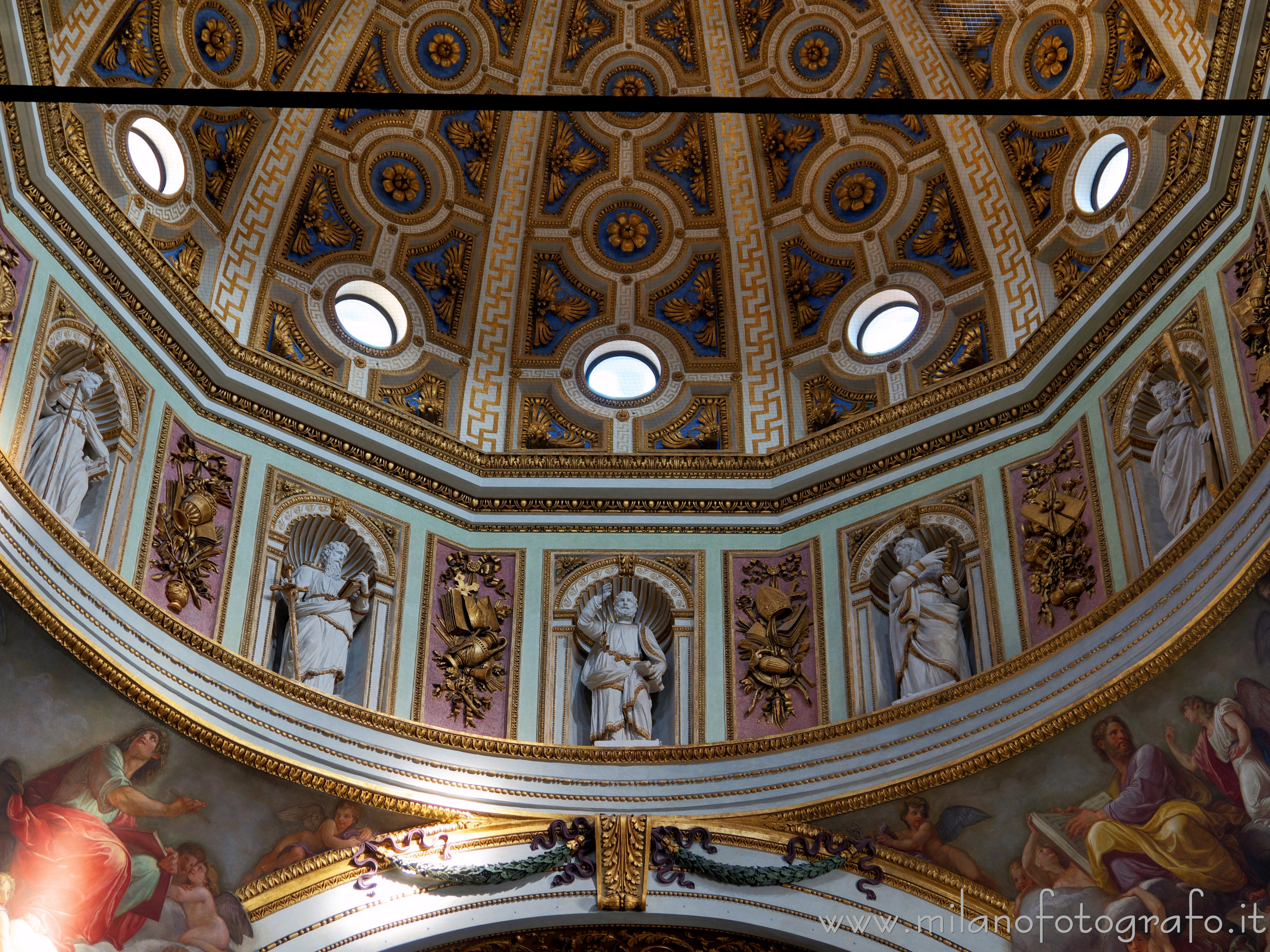 Milan (Italy) - Statues of the apostles at the base of the dome of the Church of Santa Maria dei Miracoli